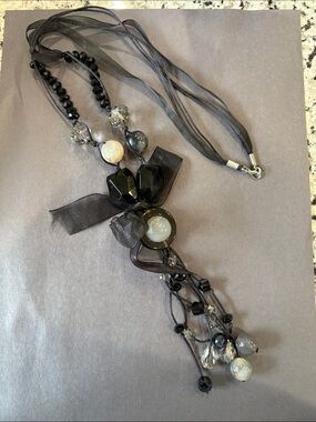 Elegant Black Beaded Pendant Necklace with Ribbon Accent